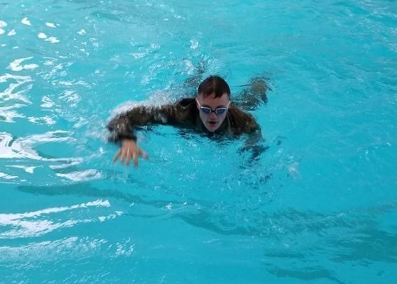 Cadet swimming during ROTC training