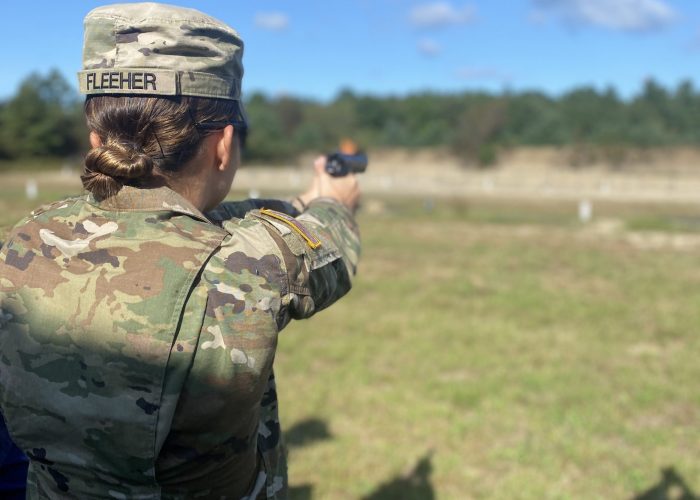 An Army ROTC cadet is testing her skills at the firing line during the G.A.F.P.B.