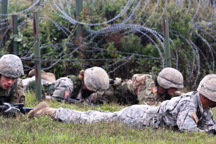 Ranger Challenge Cadets low crawl under barbed wire