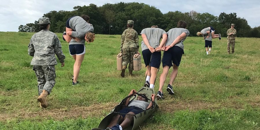 UConn Swimming and Diving Team performs casualty evacuation during sports challenge