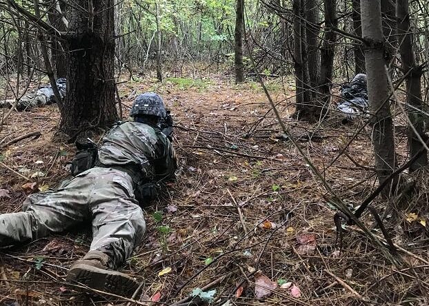 Cadets prone in security during the Fall Field Training Exercise