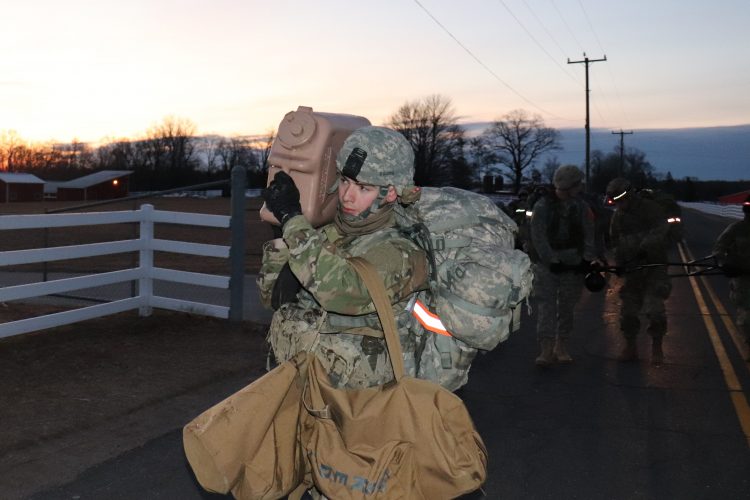 Cadet carries equipment during CASEVAC exercise