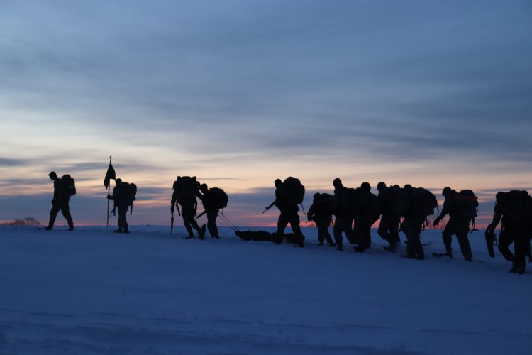 Ranger Challenge cadets snow shoe at sunrise