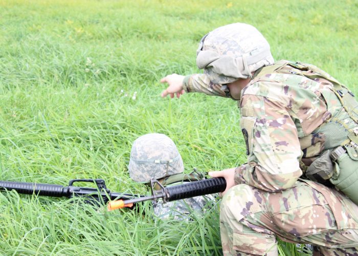 Cadet establishing security during a battle drill