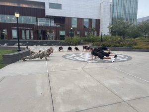 Army ROTC Cadets do pushups outside of the UConn Student Rec Center